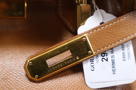 A Hermes tan leather Birkin handbag, with dust bag (puchased 1998 from Paris store) Width 35cm